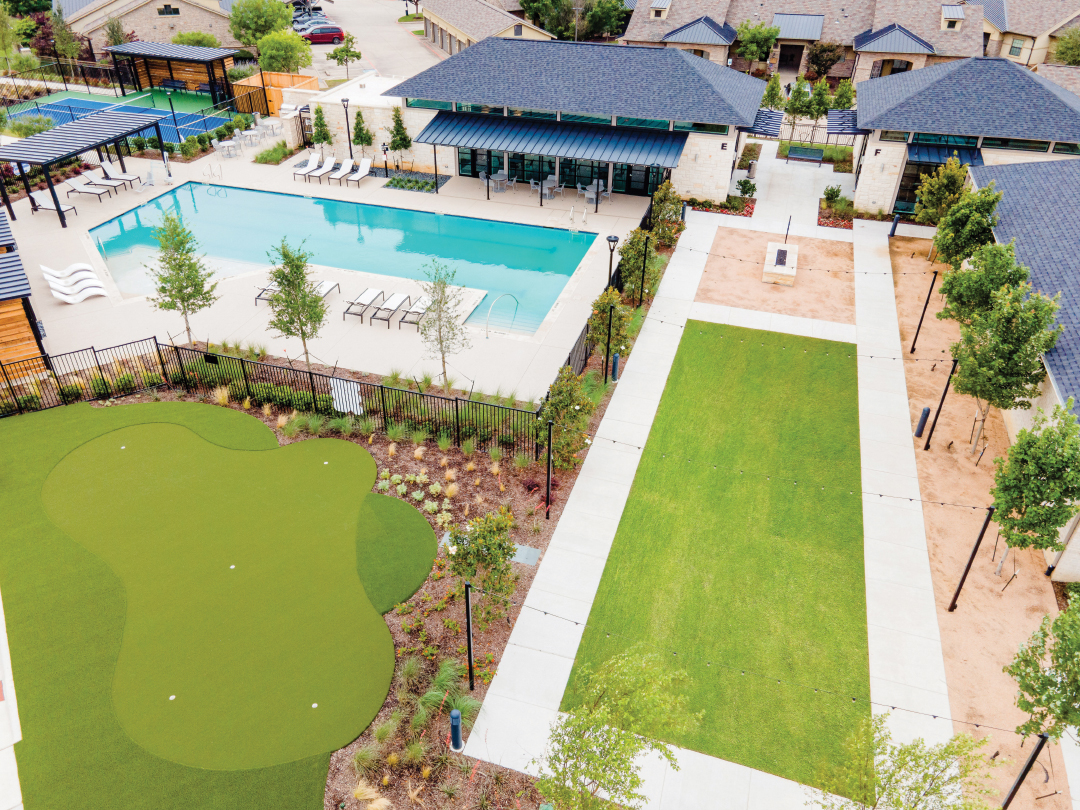Grounds at Gatherings at Twin Creeks by Beazer Homes include a pool and putting green.