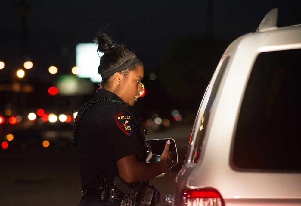 Officer Natasha Mings during overnight patrol // photos by Jenice Johnson Williams