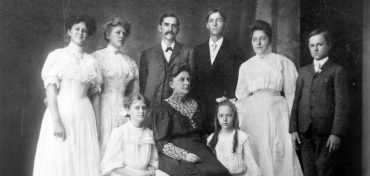 The Schimelpfenig family. Although the records are not clear, it's believed that Lydia Mary is the second from the left, top row, in the photo. // courtesy of the Genealogy Center, Plano Public Library