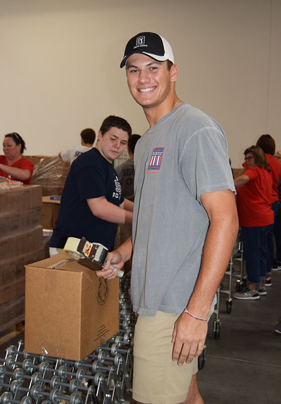 YMSL member Carson Hart serving at NTFB // photos courtesy YMSL Wildcat Chapter
