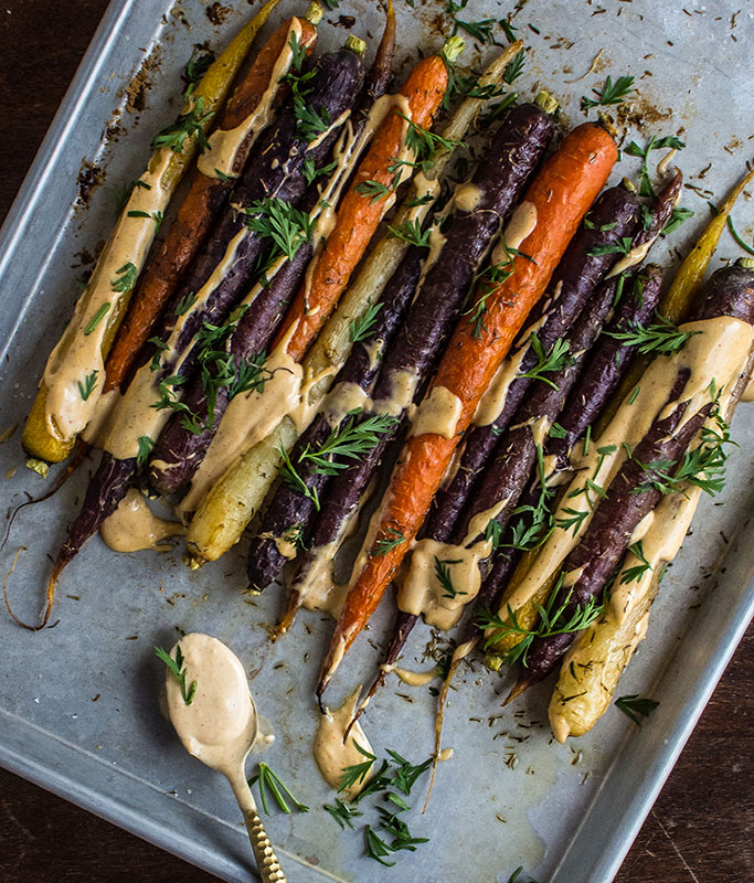Roasted Sesame Ginger Carrots with Spicy Tahini and Carrot Greens // photos Rebecca White