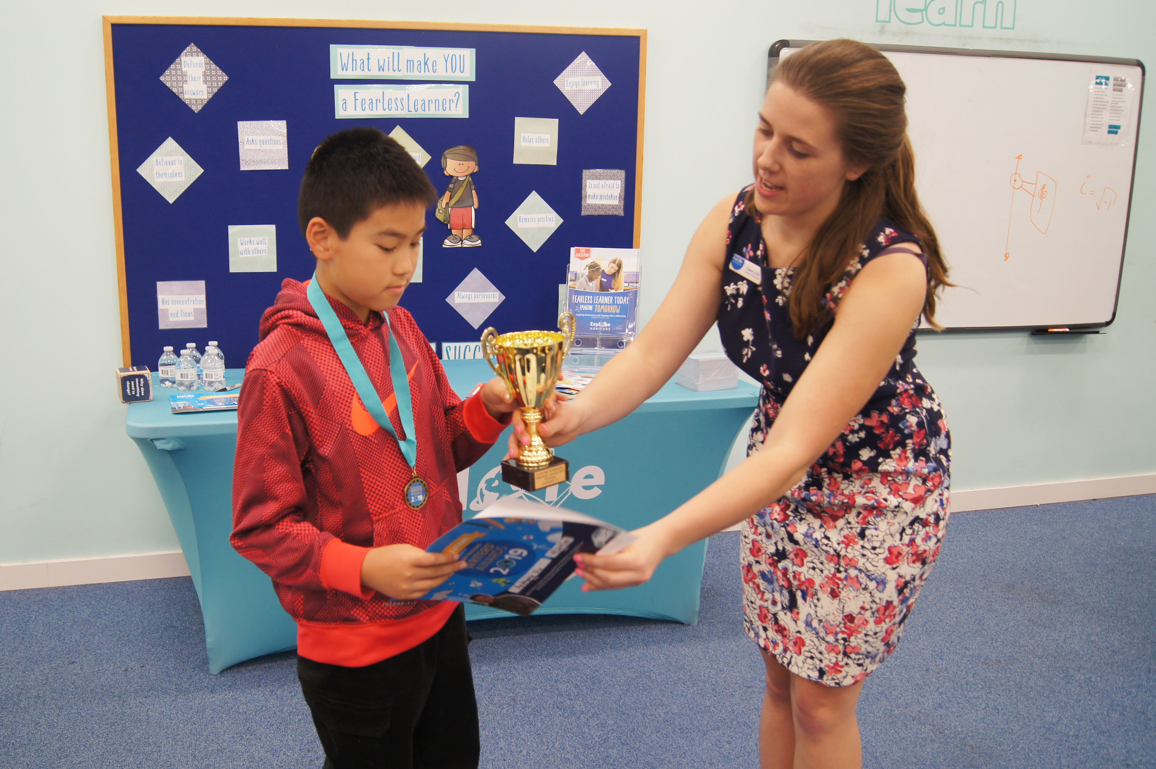 Anthony Vu receiving award