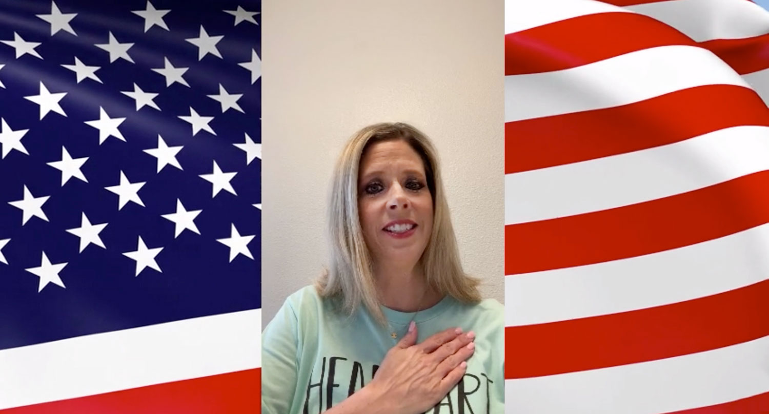Head Start Director Dr. Denise Lohmiller leads the Pledge of Allegiance in an online class // courtesy Plano ISD
