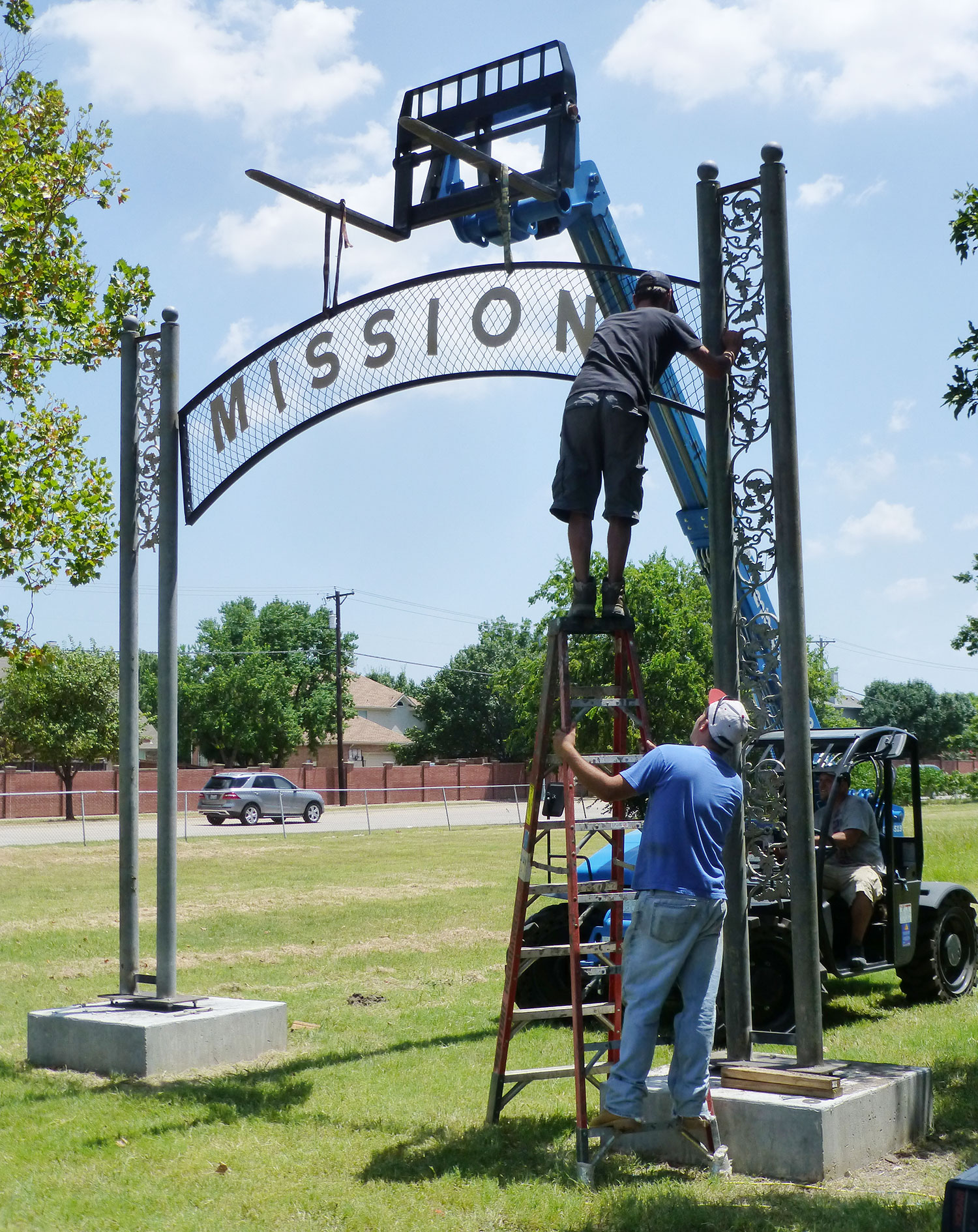 Mission signage being erected at Bethany Cemetery // photo Candace Fountoulakis