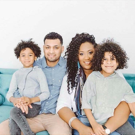 Bree Clarke with her husband, Carlos, and their twin 8-year-old sons // courtesy The Iman Project