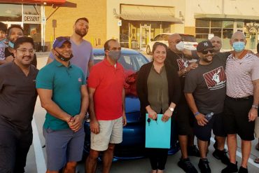 Members of Everyone Eatz with winner of the car giveaway, Viridiana Corral // photos Stephen Hunt