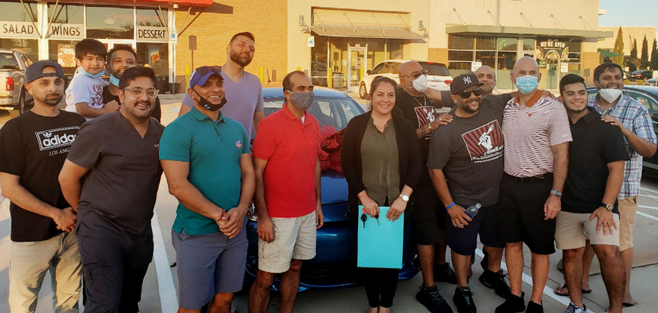 Members of Everyone Eatz with winner of the car giveaway, Viridiana Corral // photos Stephen Hunt