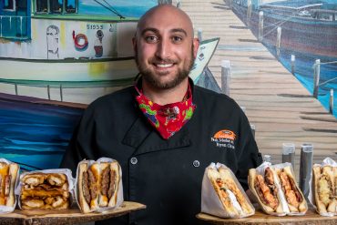 Chef Ryan Oruch with grilled cheese sandwich offerings // photos courtesy Plano Grilled Cheese Company