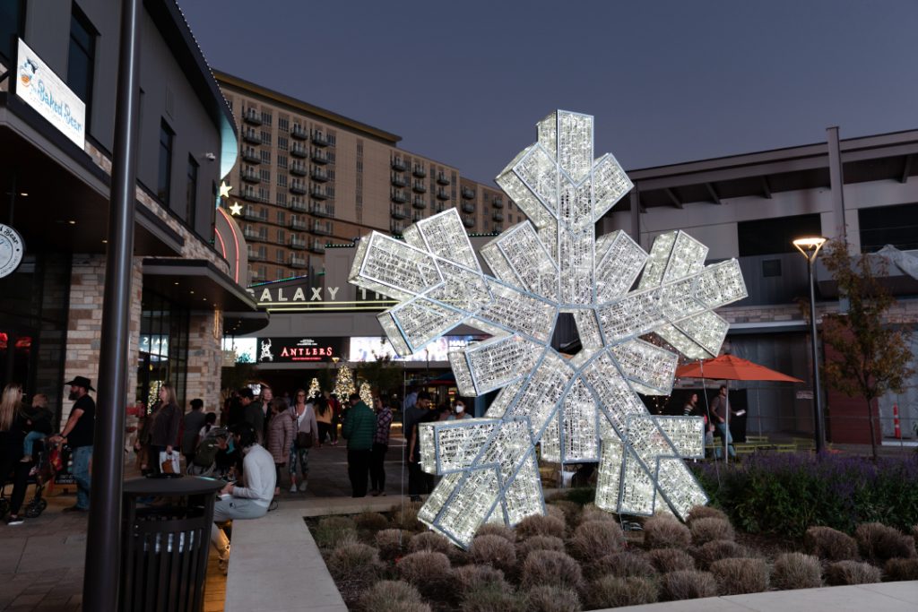 A giant illuminated snowflake at Grandscape's holiday magic
