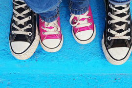 Getty image of adult and child shoes for Run for the Kids