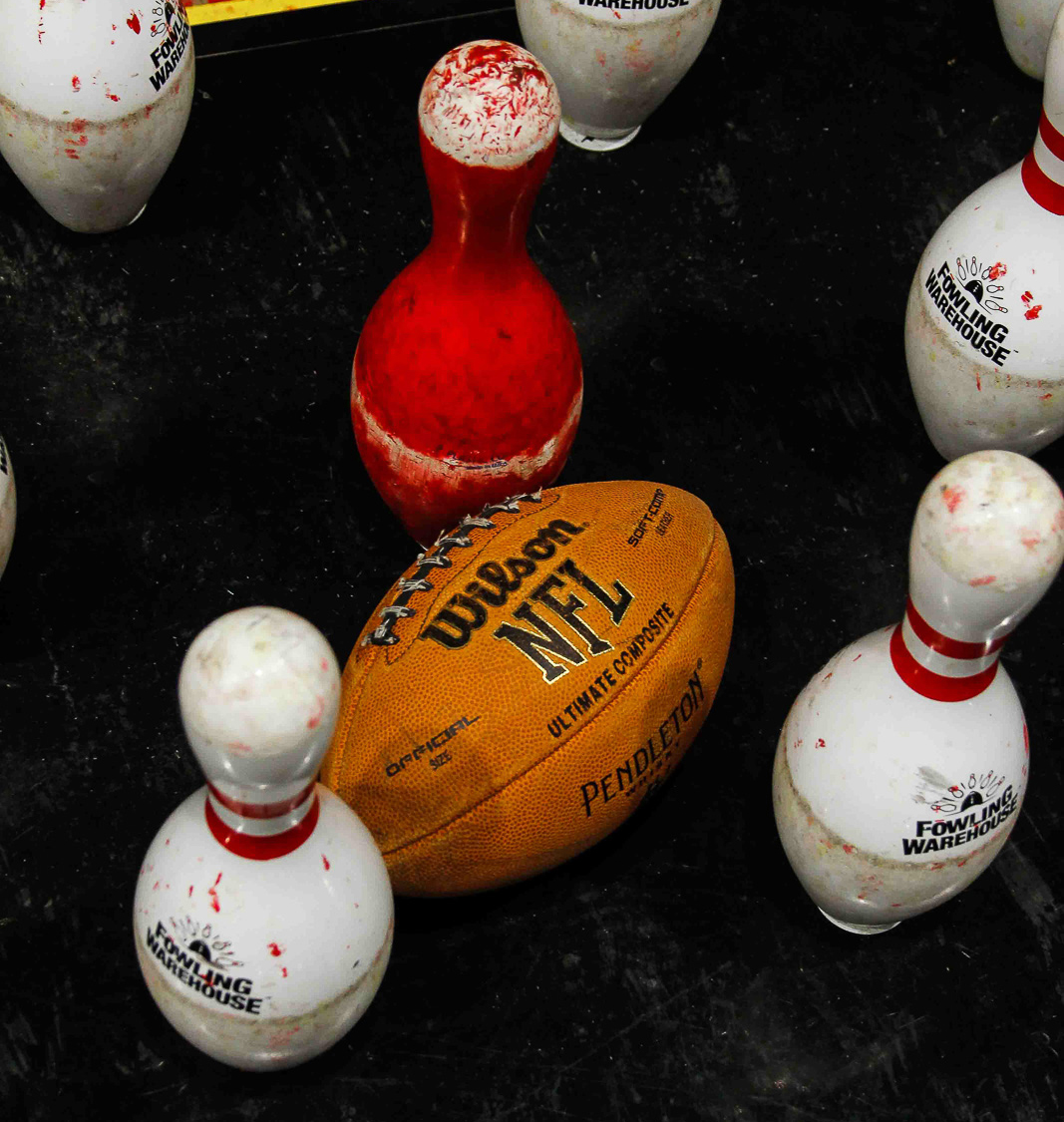 Bowling pins and a football at Fowling Warehouse photography Kelsey Shoemaker
