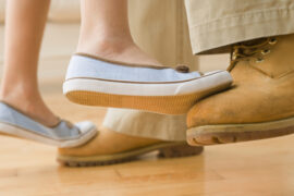 daughter's feet on daddy's dancing
