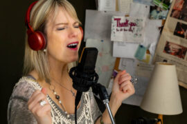 Julie Ann Kennedy records a song. Photo by Yuvie Styles