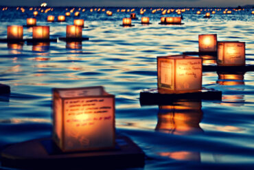 The Lantern Floating Hawaii ceremony. The ceremony allows for a personal and collective moment of remembrance, reflection, and offering gratitude to those who have gone before us.The theme of Lantern Floating Hawaii is "Many Rivers, One Ocean."