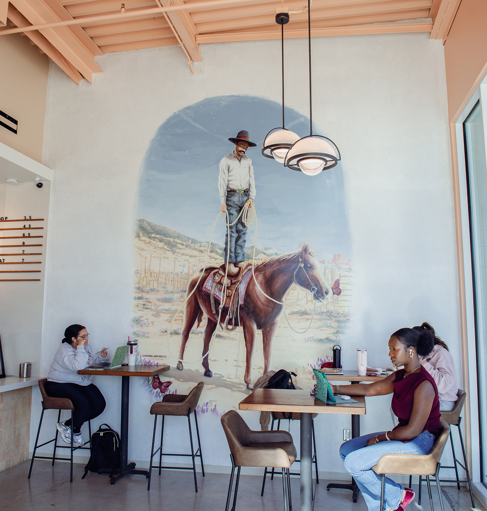 Cowboy mural by Michael McPheeters (@michaelmcpheeters). Photo by Lauren Allen.